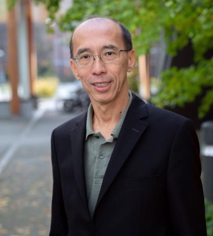 individual full-body photo shoot outside DSI building